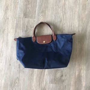 Gently used navy blue Longchamp bag